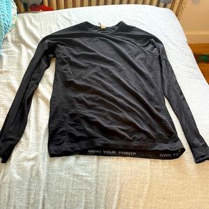 This is a Athleta girls long sleeve athletic top, color is black and is great